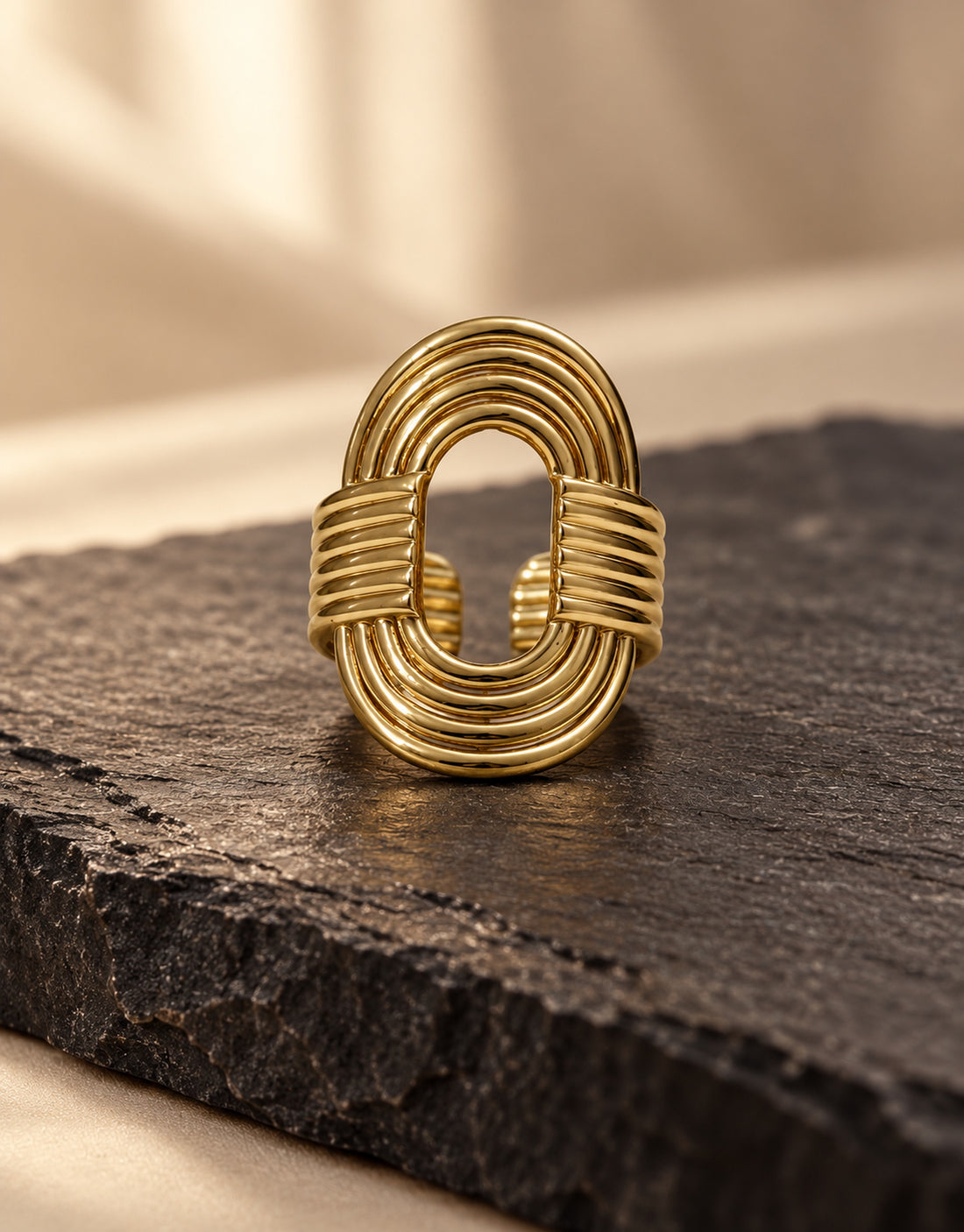 Orneza Gold-Tone Ribbed Open Oval Ring — styled view