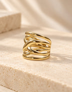 Orneza Gold-Tone Wavy Interlaced Wide Ring — angle view