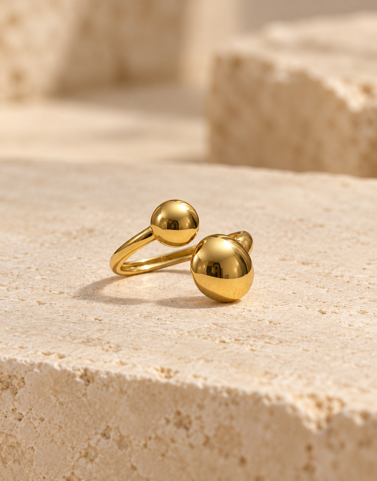 Orneza Gold-Tone Open Twin Ball Ring — front view