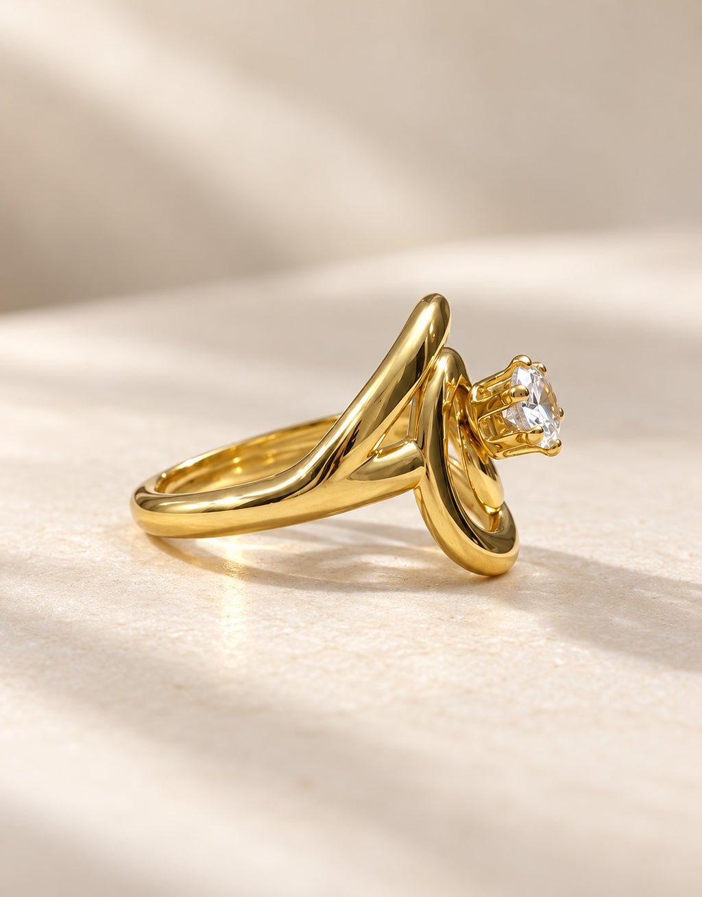 Orneza Gold-Tone Spiral Clear Stone Ring — angle view