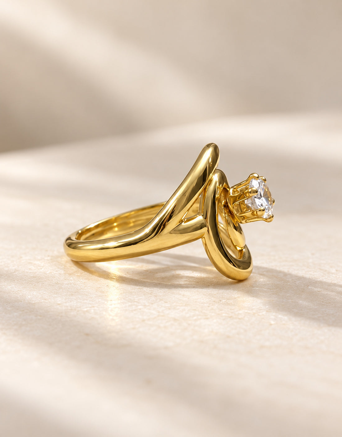 Orneza Gold-Tone Spiral Clear Stone Ring — angle view