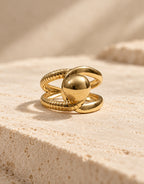 Orneza Gold-Tone Ball and Ribbed Loop Ring — front view