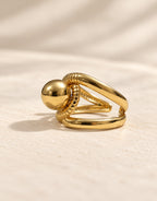 Orneza Gold-Tone Ball and Ribbed Loop Ring — angle view