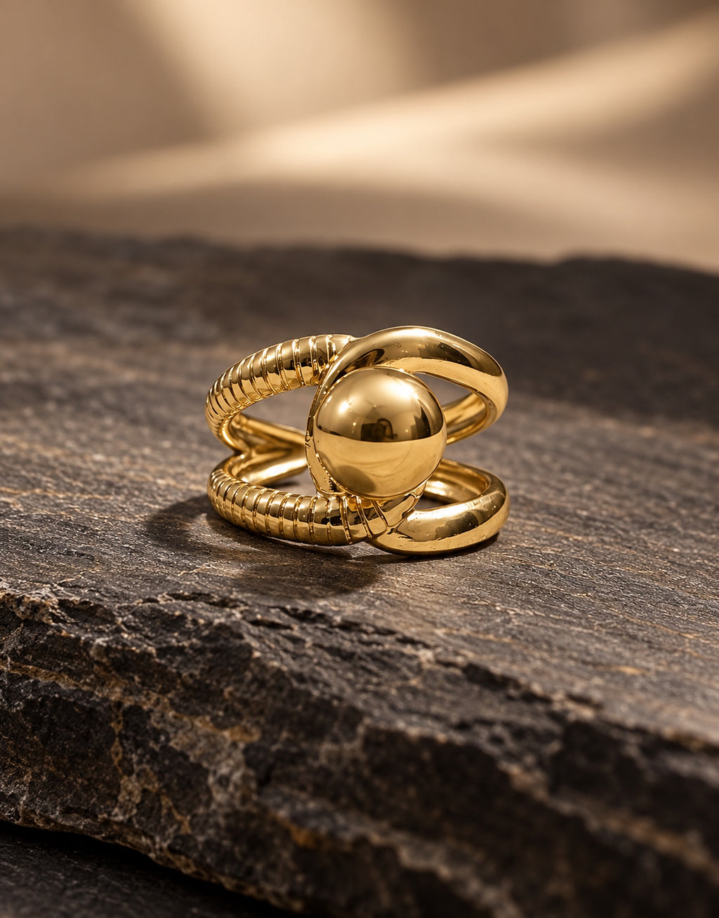 Orneza Gold-Tone Ball and Ribbed Loop Ring — styled view