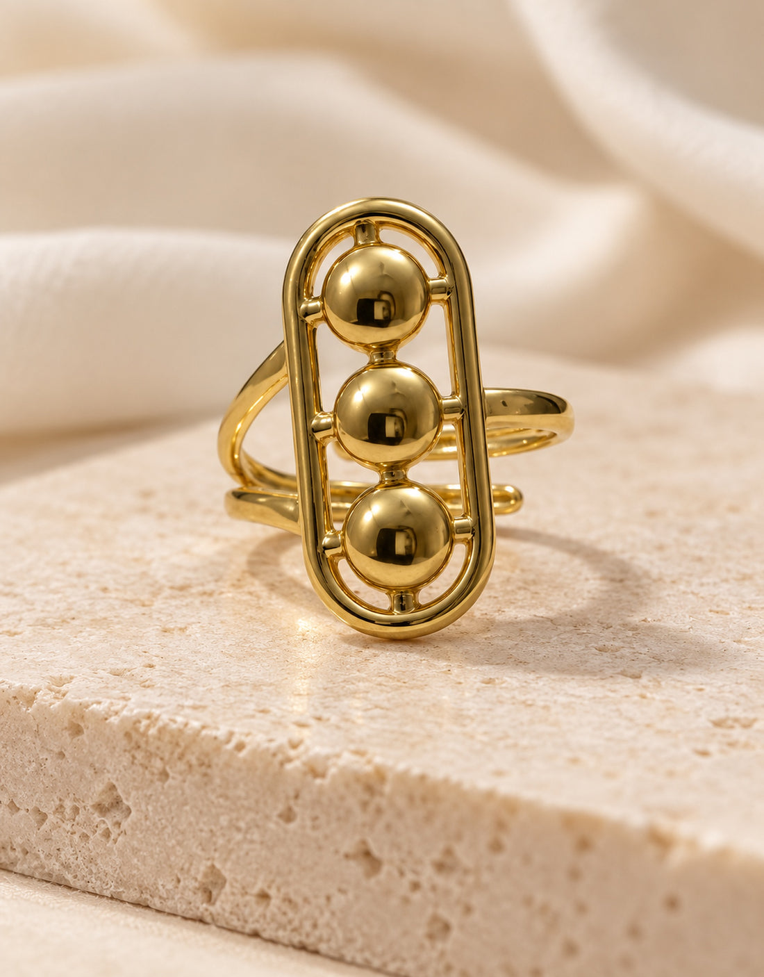 Orneza Gold-Tone Three Ball Oval Frame Ring — styled view