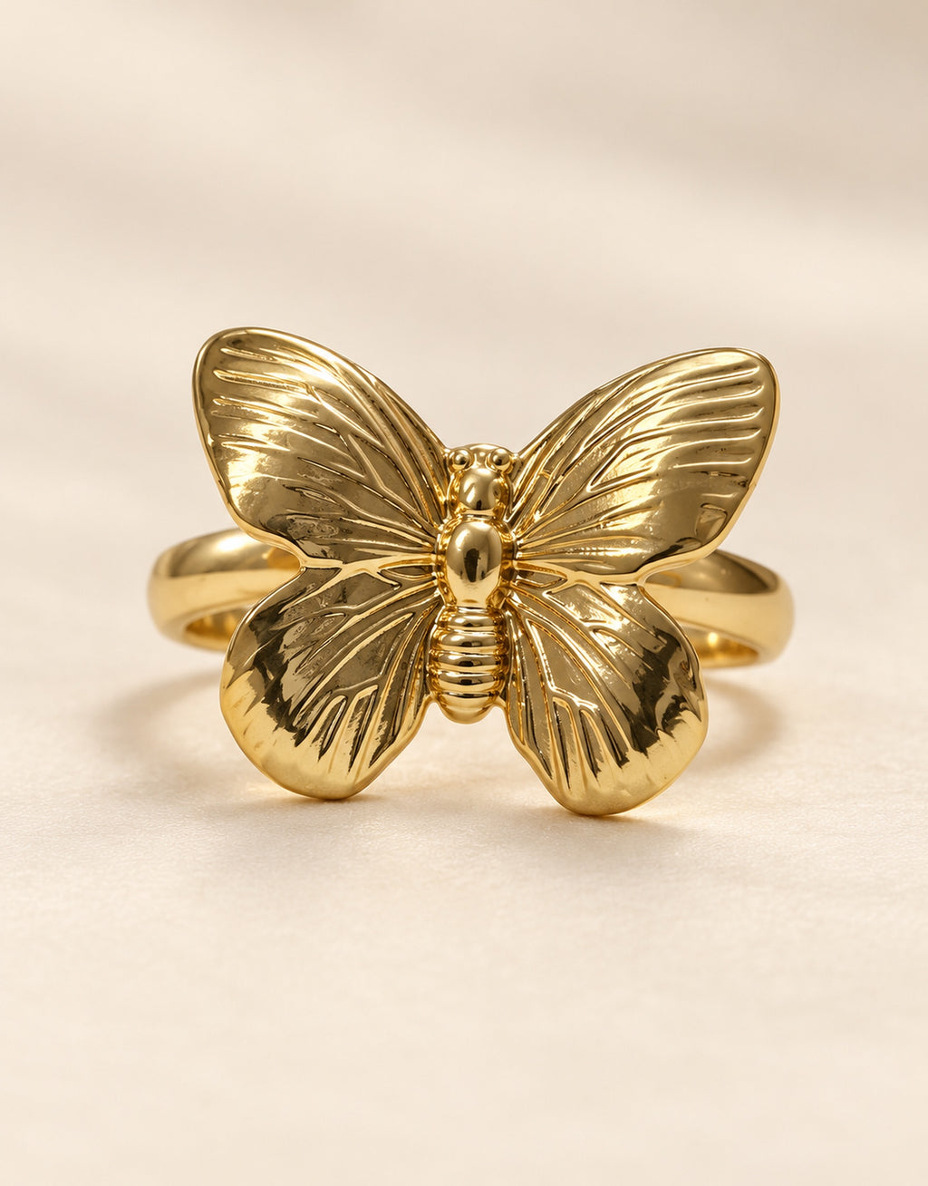 Orneza Gold-Tone Ribbed Wing Butterfly Ring — front view