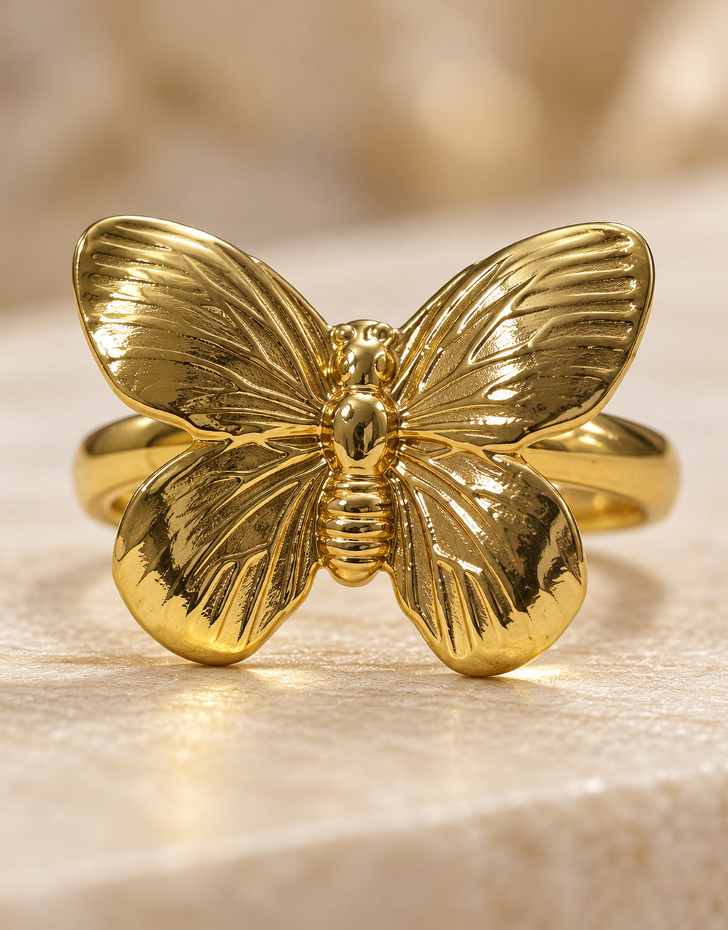 Orneza Gold-Tone Ribbed Wing Butterfly Ring — detail view