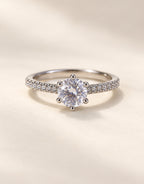 Orneza Silver-Tone Round Solitaire Pave Ring — front view