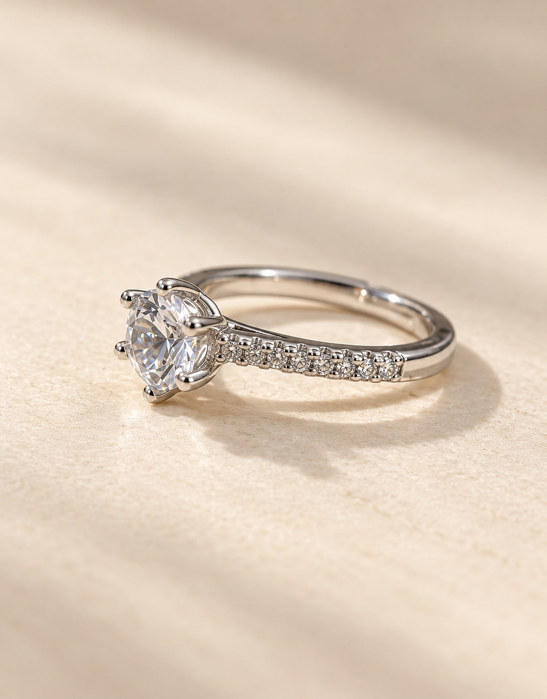 Orneza Silver-Tone Round Solitaire Pave Ring — angle view