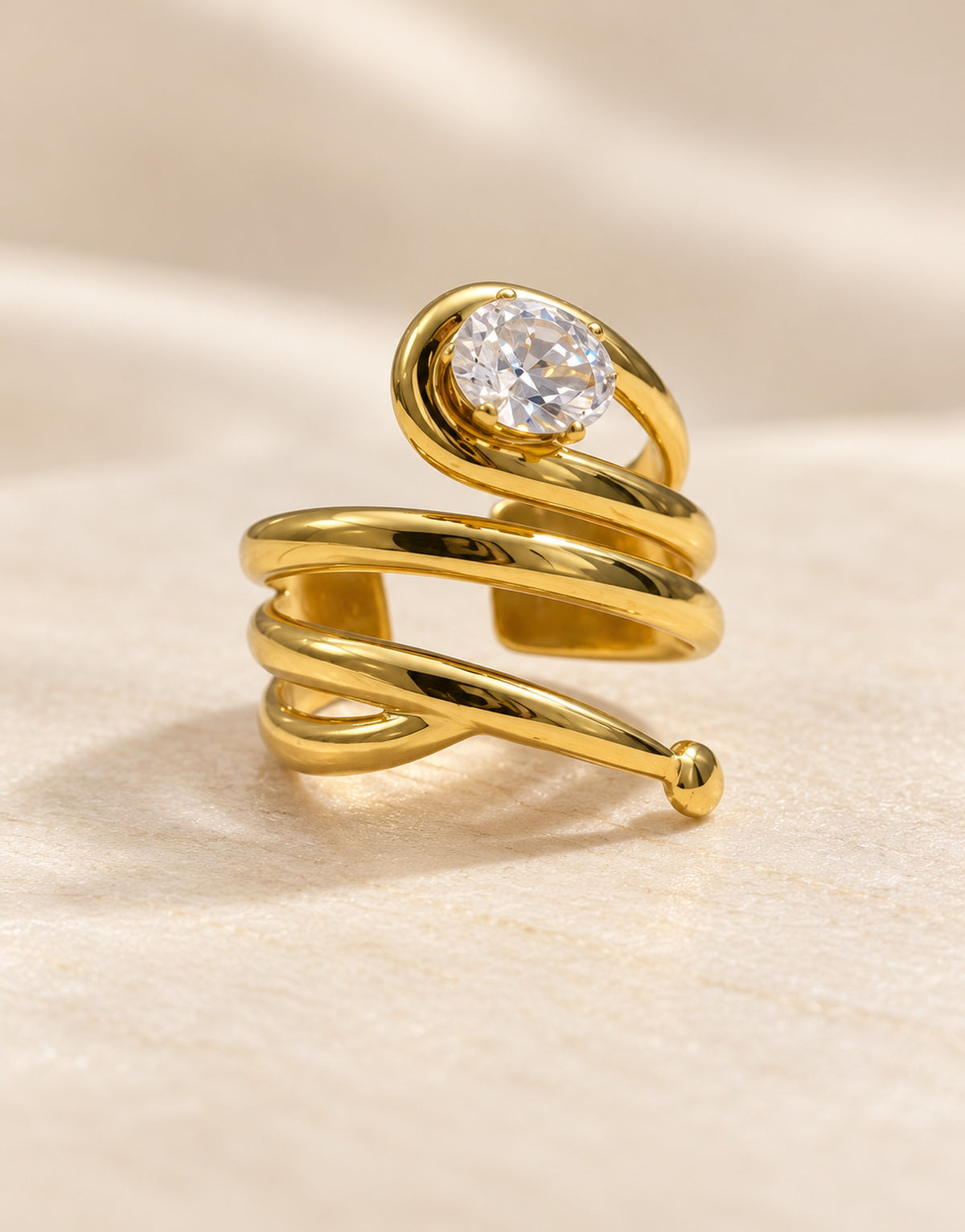 Orneza Gold-Tone Coiled Spiral Clear Stone Ring — angle view
