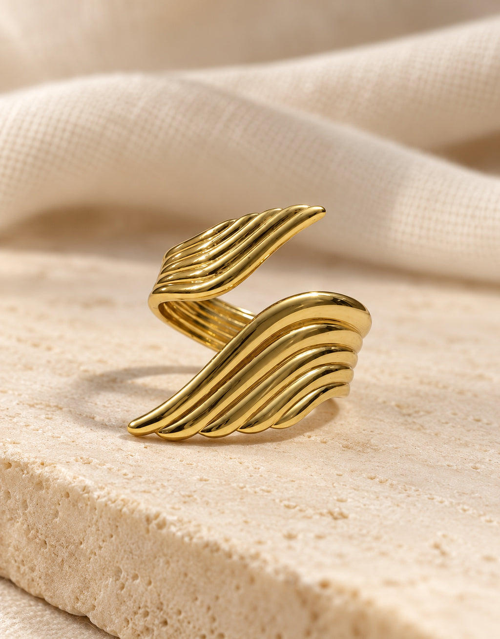 Orneza Gold-Tone Ribbed Double Wing Ring — styled view