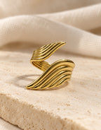Orneza Gold-Tone Ribbed Double Wing Ring — styled view
