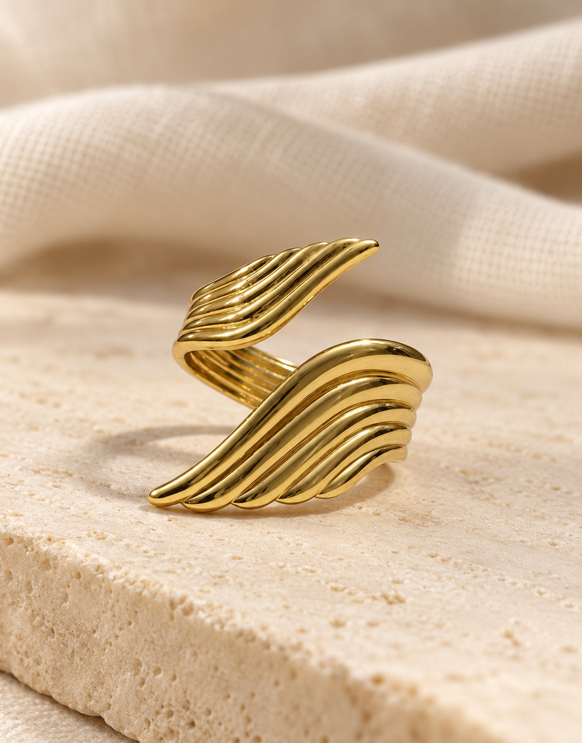 Orneza Gold-Tone Ribbed Double Wing Ring — styled view