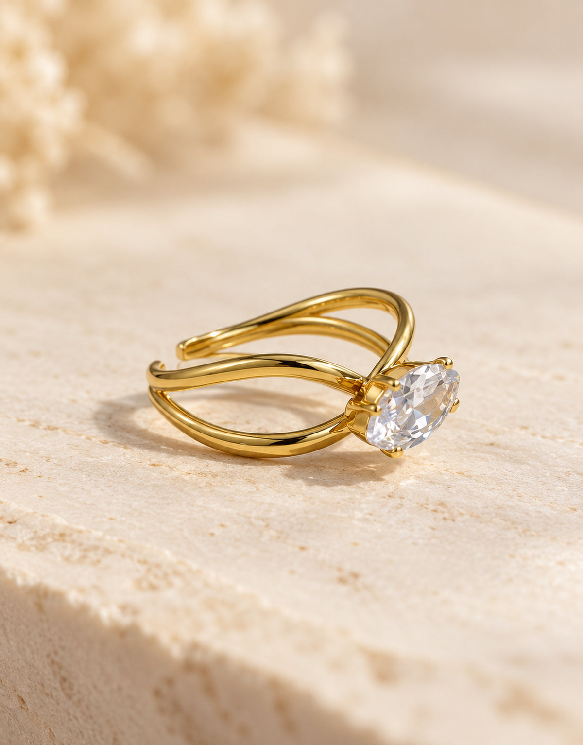 Orneza Gold-Tone Looped Marquise Stone Ring — angle view