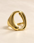 Orneza Gold-Tone Sculptural Open Loop Ring — front view