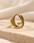 Orneza Gold-Tone Sculptural Open Loop Ring — styled view