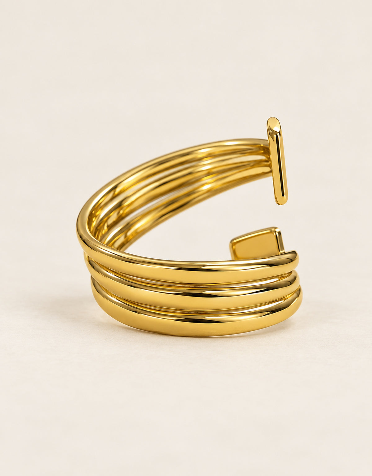 Orneza Gold-Tone Square End Coil Ring — angle view