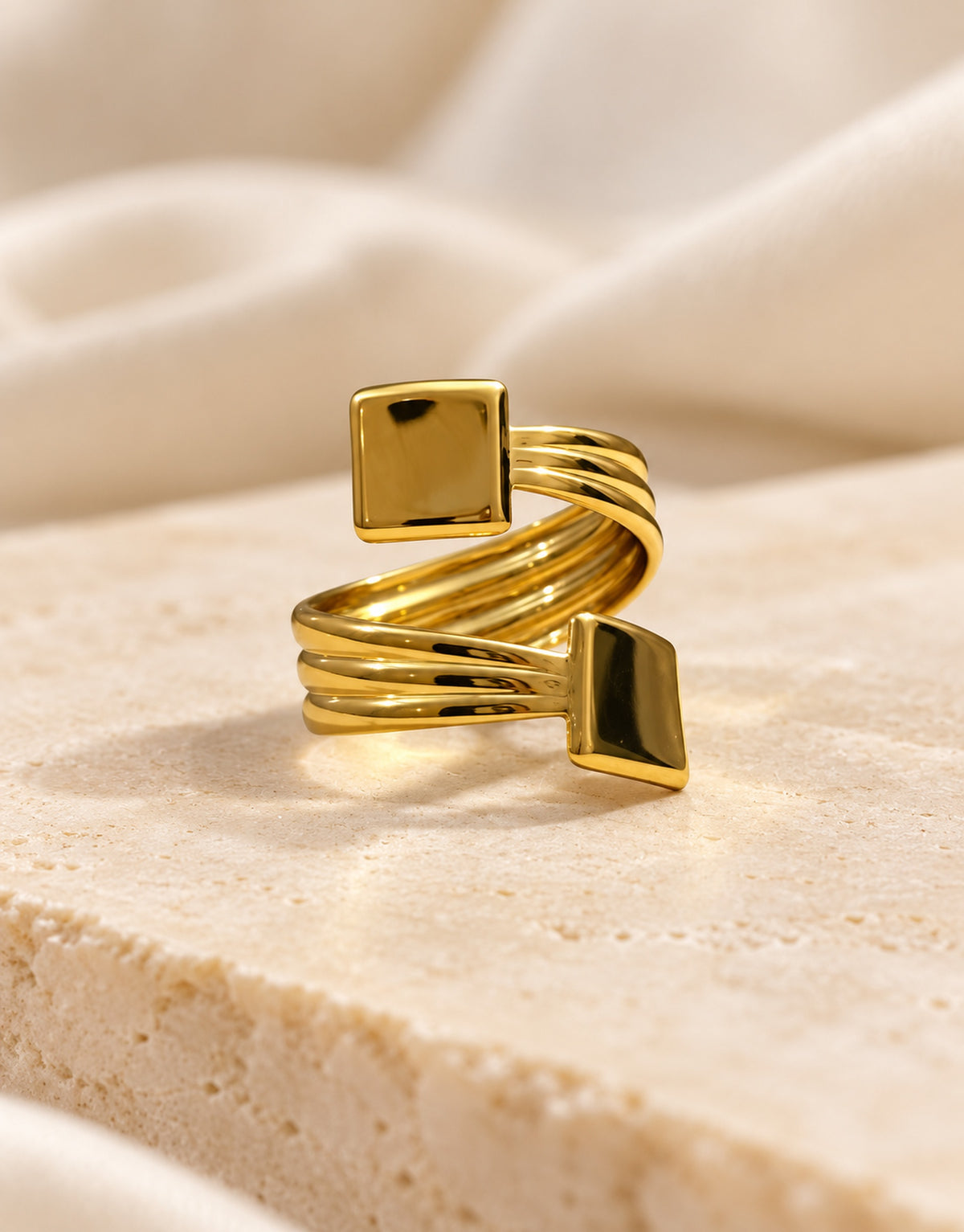 Orneza Gold-Tone Square End Coil Ring — styled view