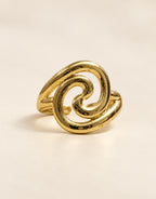 Orneza Gold-Tone Swirl Front Ring — front view