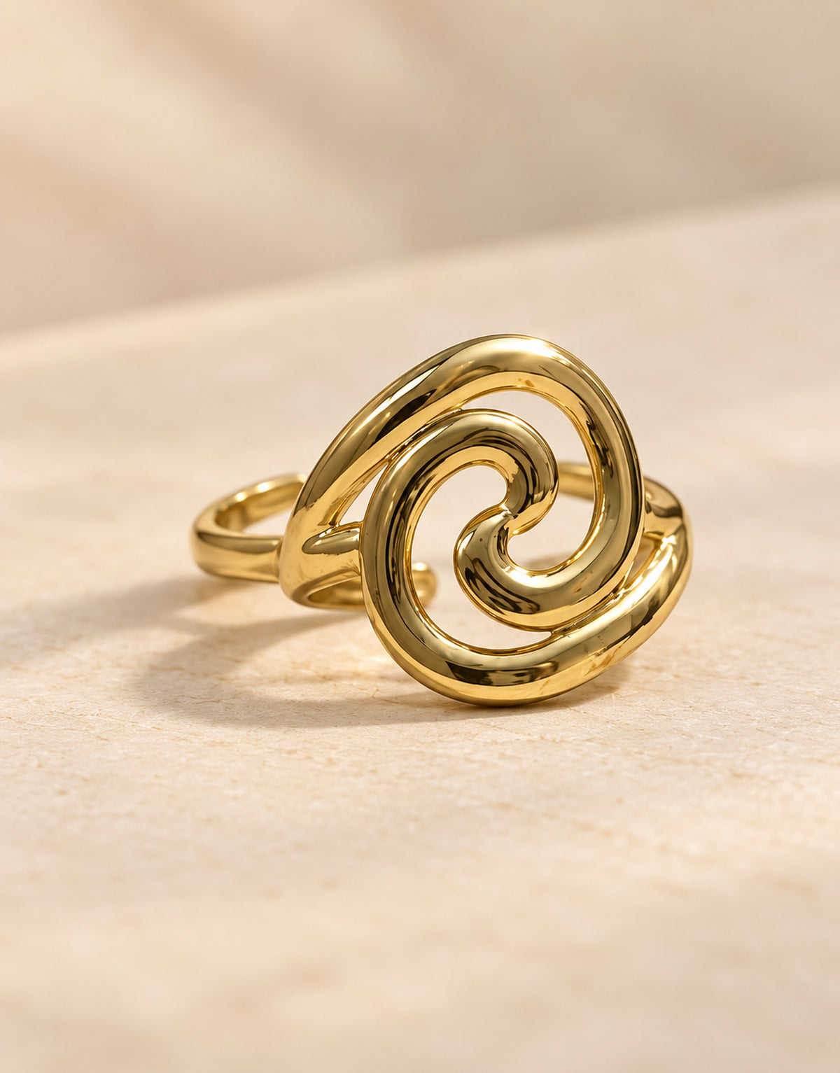 Orneza Gold-Tone Swirl Front Ring — angle view