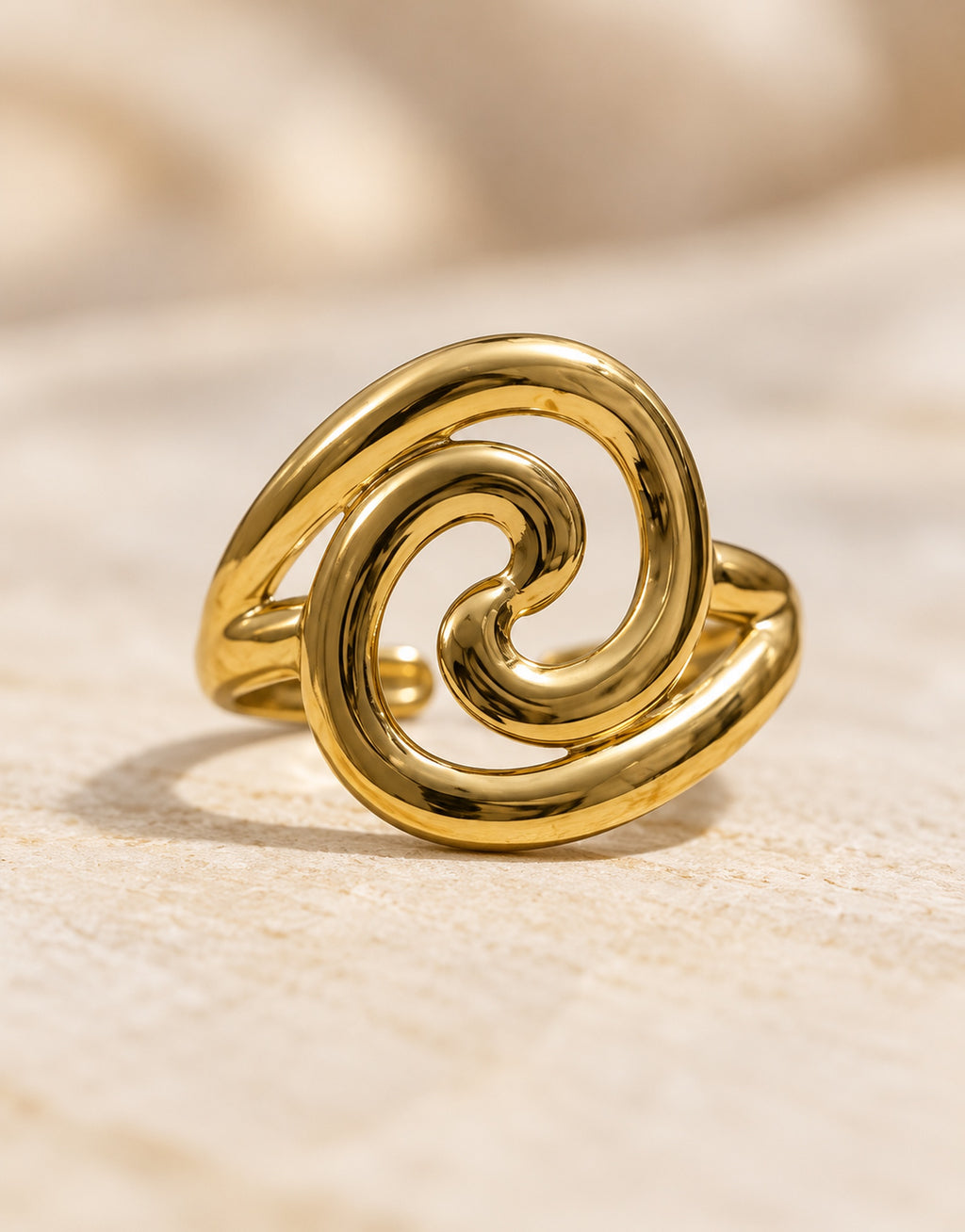 Orneza Gold-Tone Swirl Front Ring — detail view