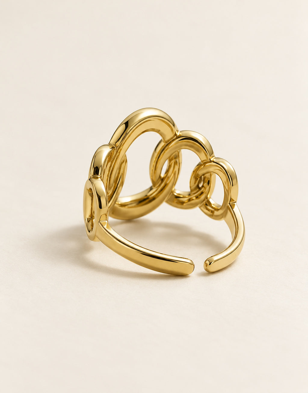 Orneza Gold-Tone Linked Loop Ring — angle view