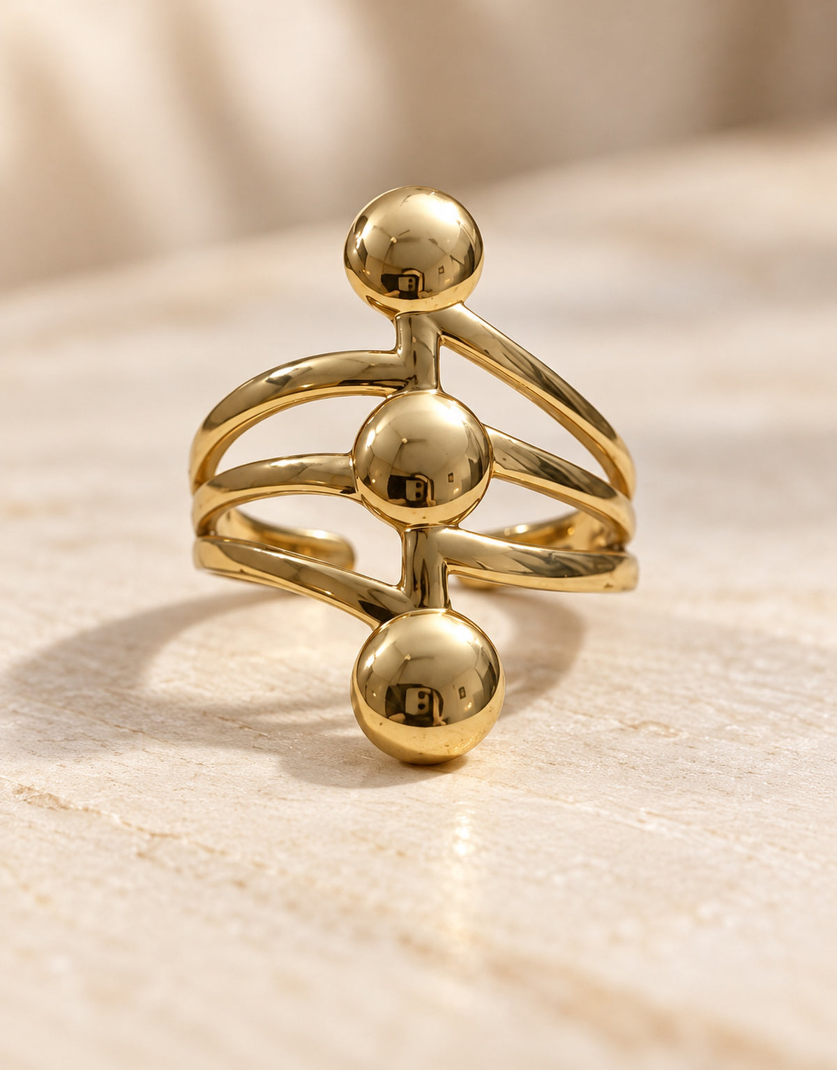 Orneza Gold-Tone Three Ball Stacked Ring — detail view