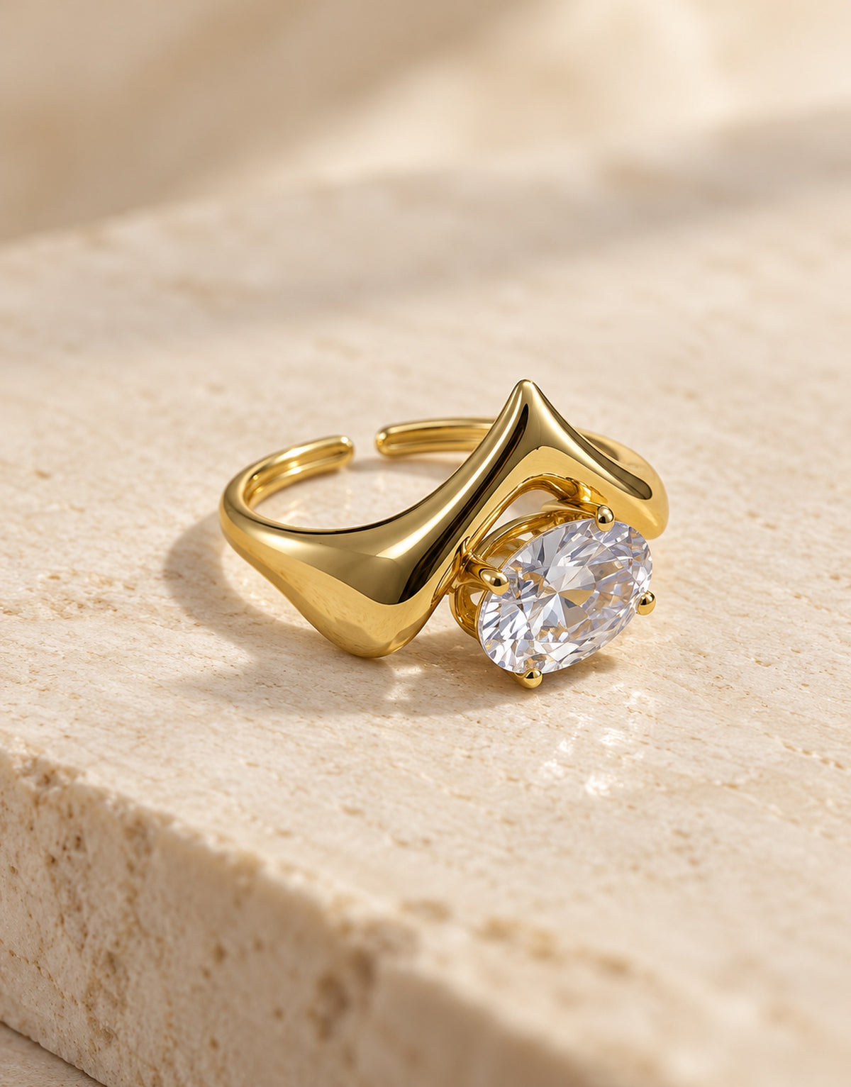 Orneza Gold-Tone Pointed V Clear Stone Ring — angle view