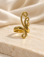 Orneza Gold-Tone Scroll Swirl Ring — styled view