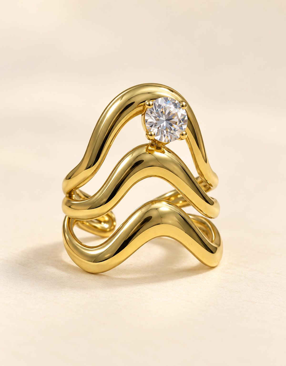 Orneza Gold-Tone Wavy Stacked Clear Stone Ring — front view