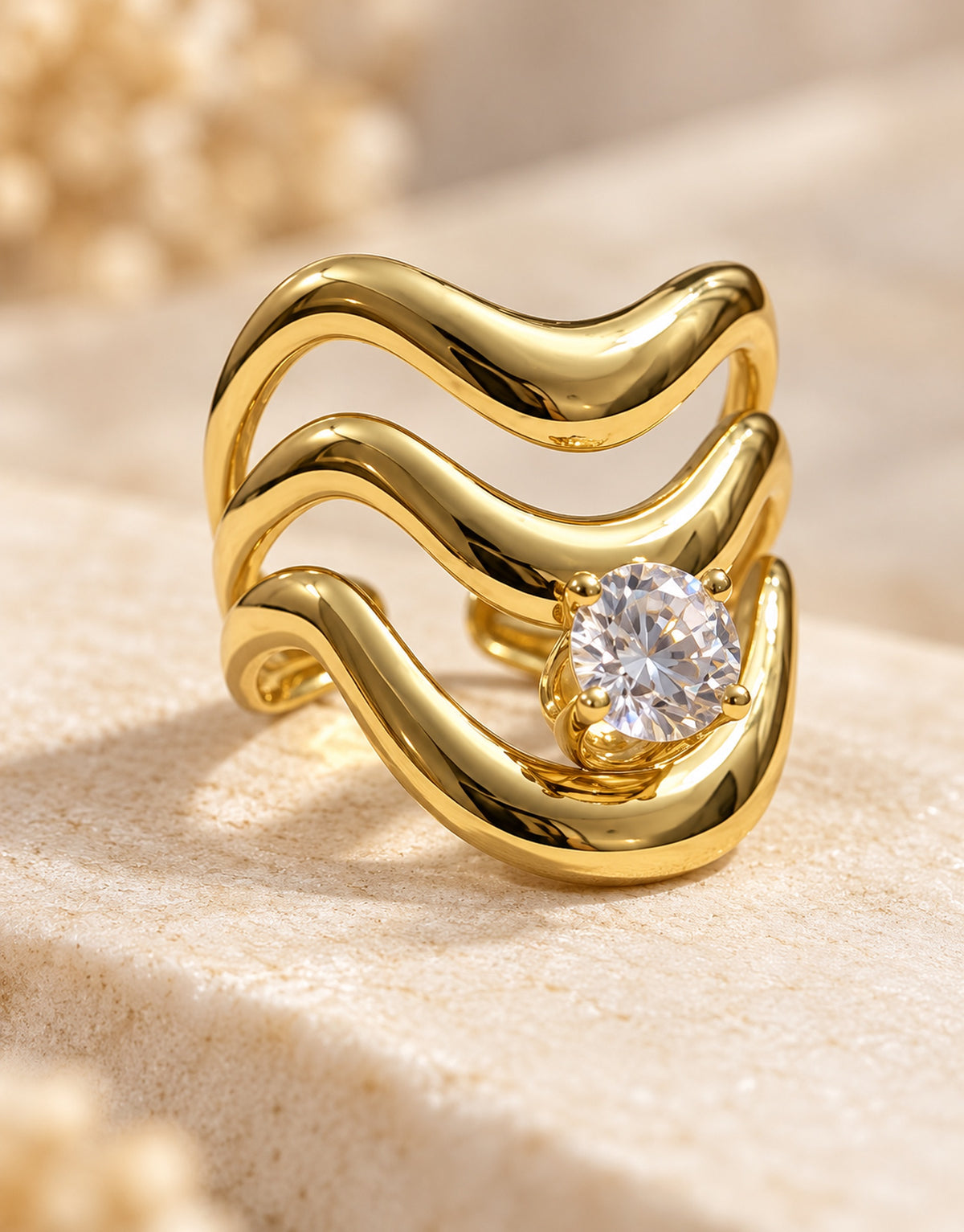 Orneza Gold-Tone Wavy Stacked Clear Stone Ring — detail view