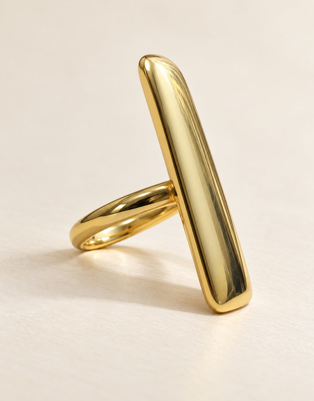 Orneza Gold-Tone Long Polished Bar Ring — angle view