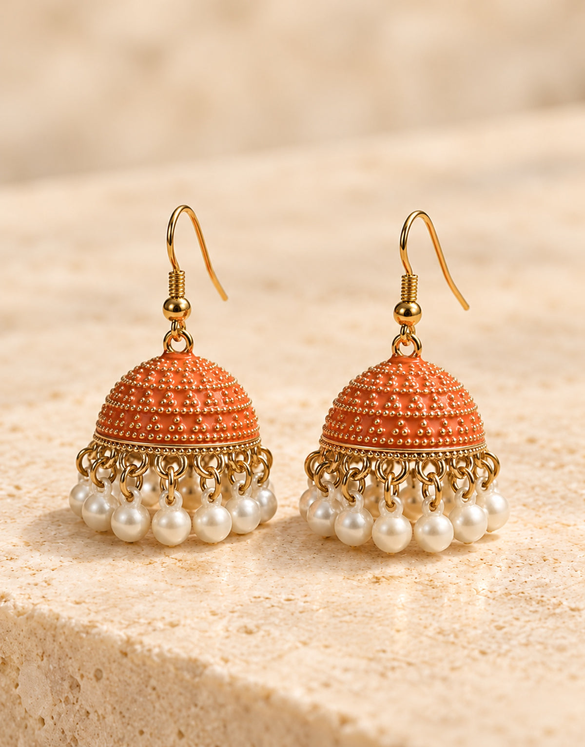 Orneza Orange Dotted Enamel Jhumka Earrings with Pearls — front view