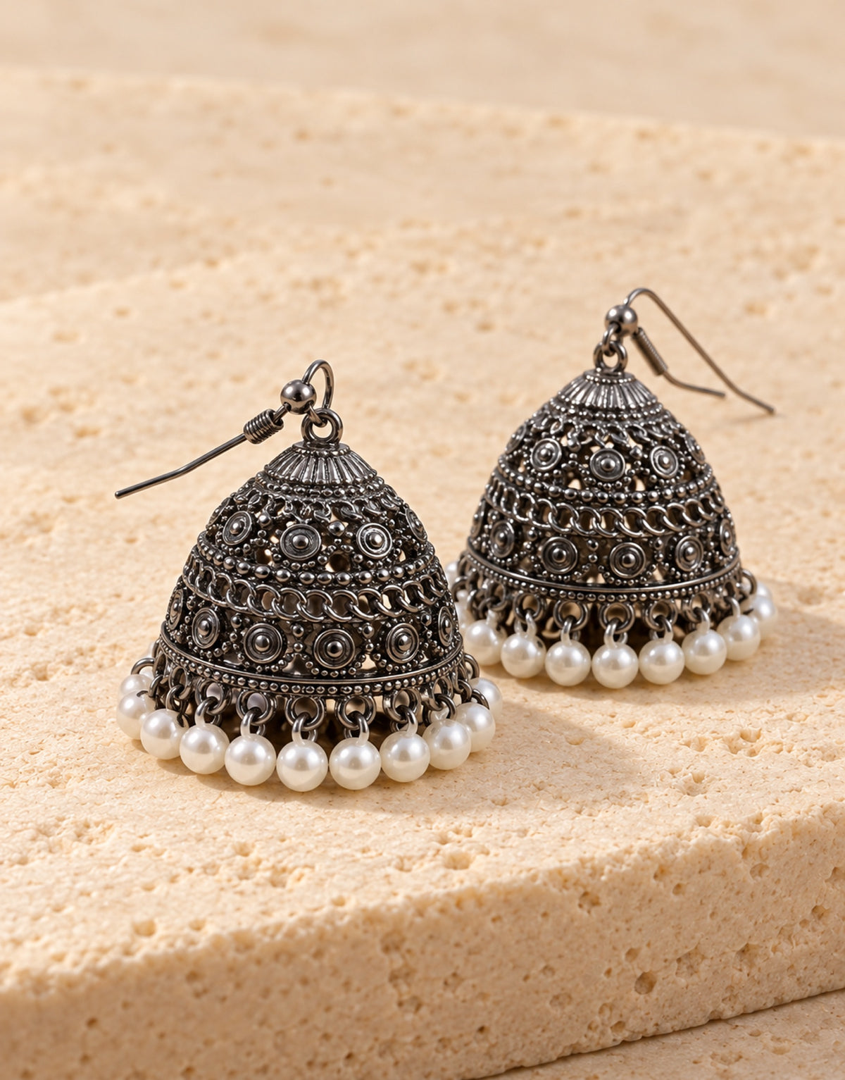 Orneza Oxidised Filigree Jhumka Earrings with Pearls — angle view