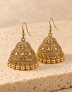 Orneza Gold-Tone Diamond Lattice Jhumka Earrings with Gold Beads — angle view