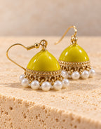 Orneza Yellow Enamel Jhumka Earrings with Pearls — close-up detail