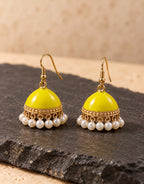Orneza Yellow Enamel Jhumka Earrings with Pearls — styled view