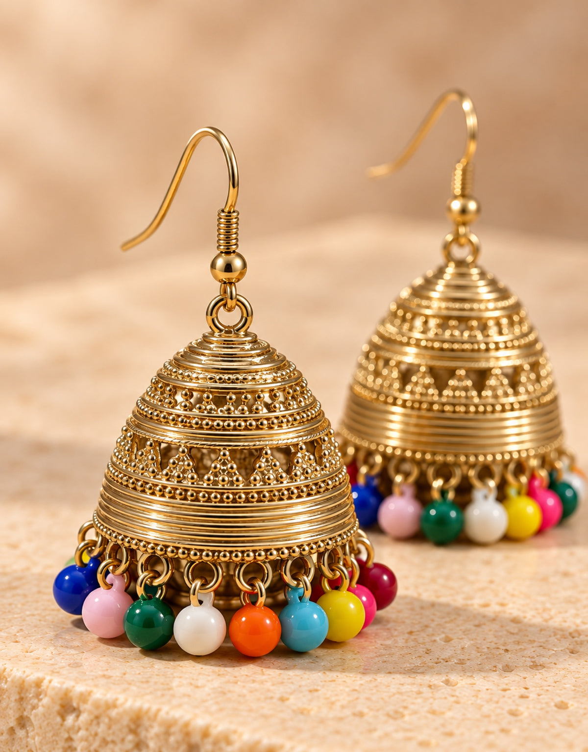 Orneza Gold-Tone Ribbed Bell Jhumka Earrings with Multicolour Beads — close-up detail