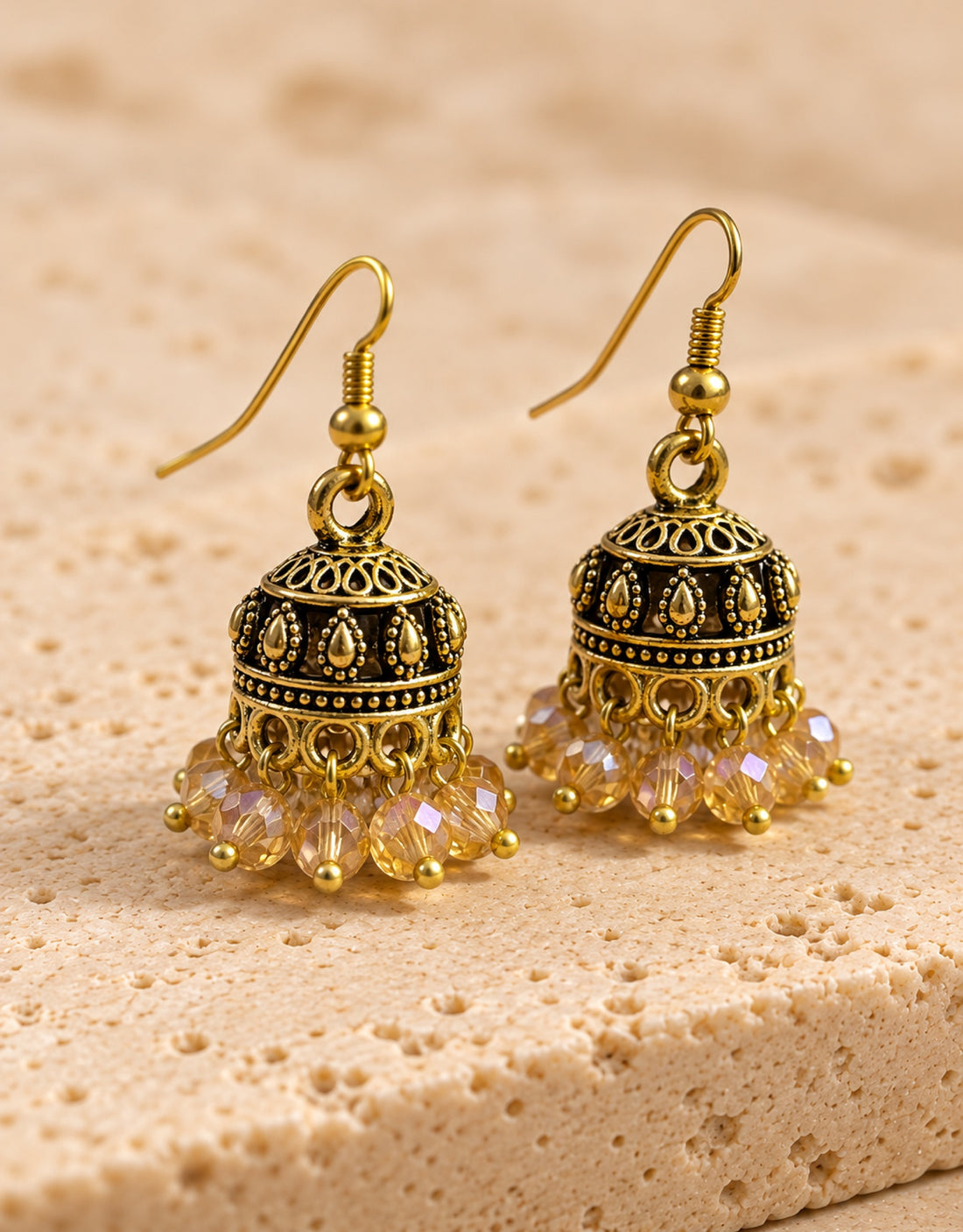 Orneza Antique Gold-Tone Mini Jhumka Earrings with Champagne Beads — angle view