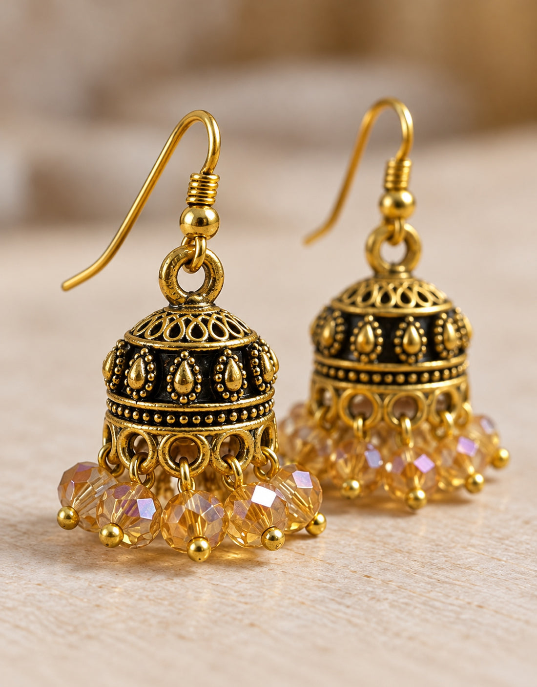 Orneza Antique Gold-Tone Mini Jhumka Earrings with Champagne Beads — close-up detail