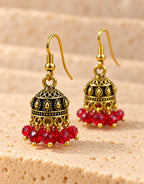 Orneza Antique Gold-Tone Mini Jhumka Earrings with Red Beads — close-up detail