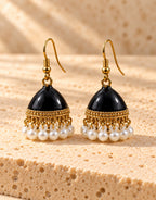 Orneza Black Enamel Jhumka Earrings with Pearls — front view