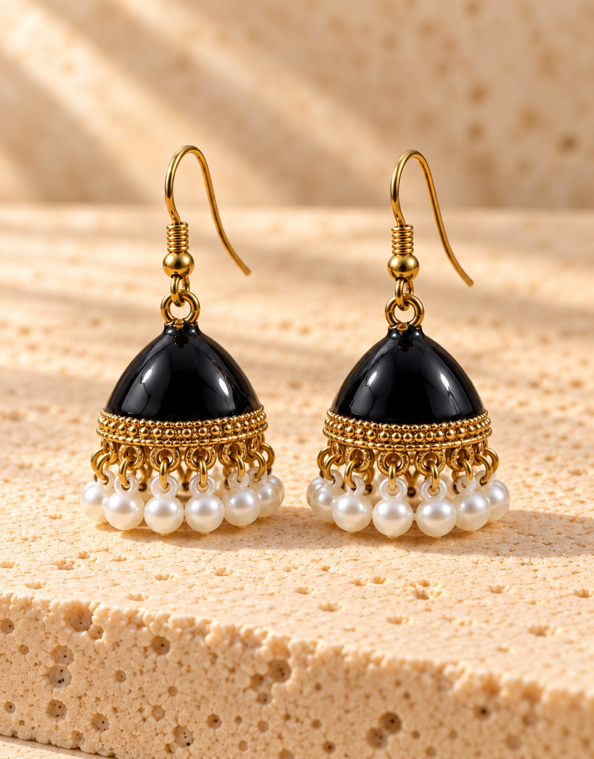 Orneza Black Enamel Jhumka Earrings with Pearls — front view
