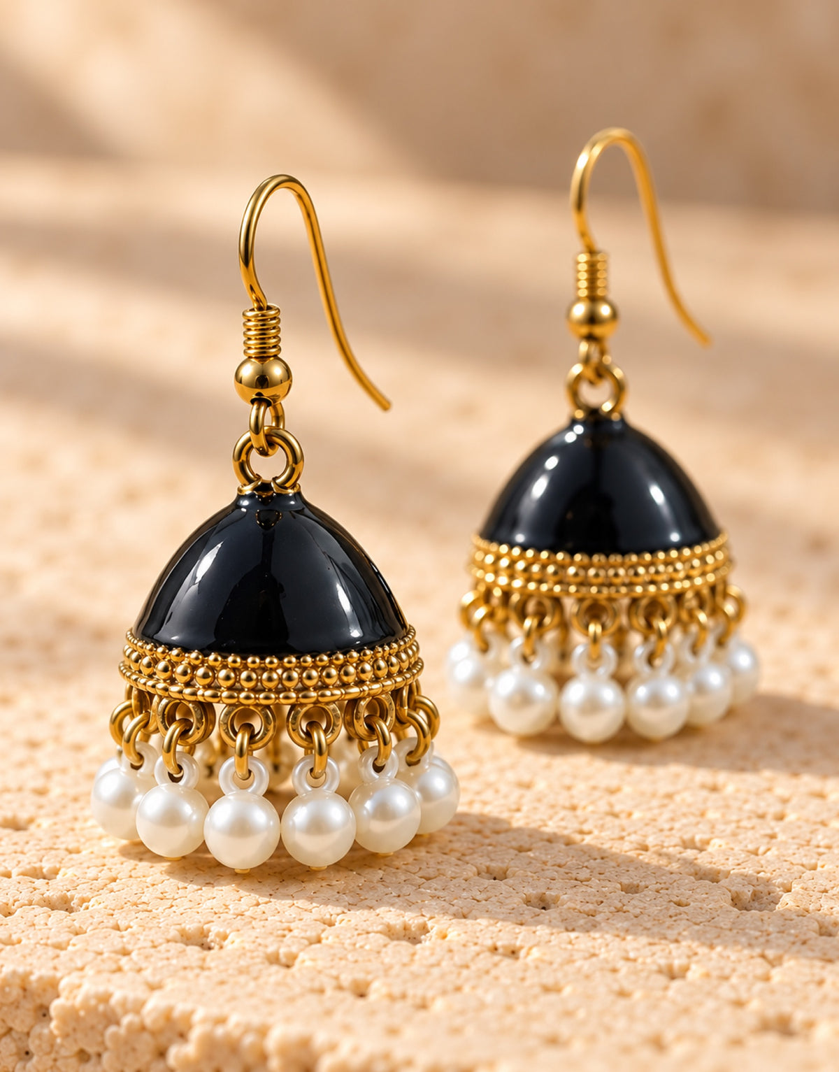 Orneza Black Enamel Jhumka Earrings with Pearls — close-up detail