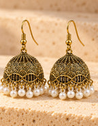 Orneza Antique Gold-Tone Scallop Pattern Jhumka Earrings with Pearls — front view