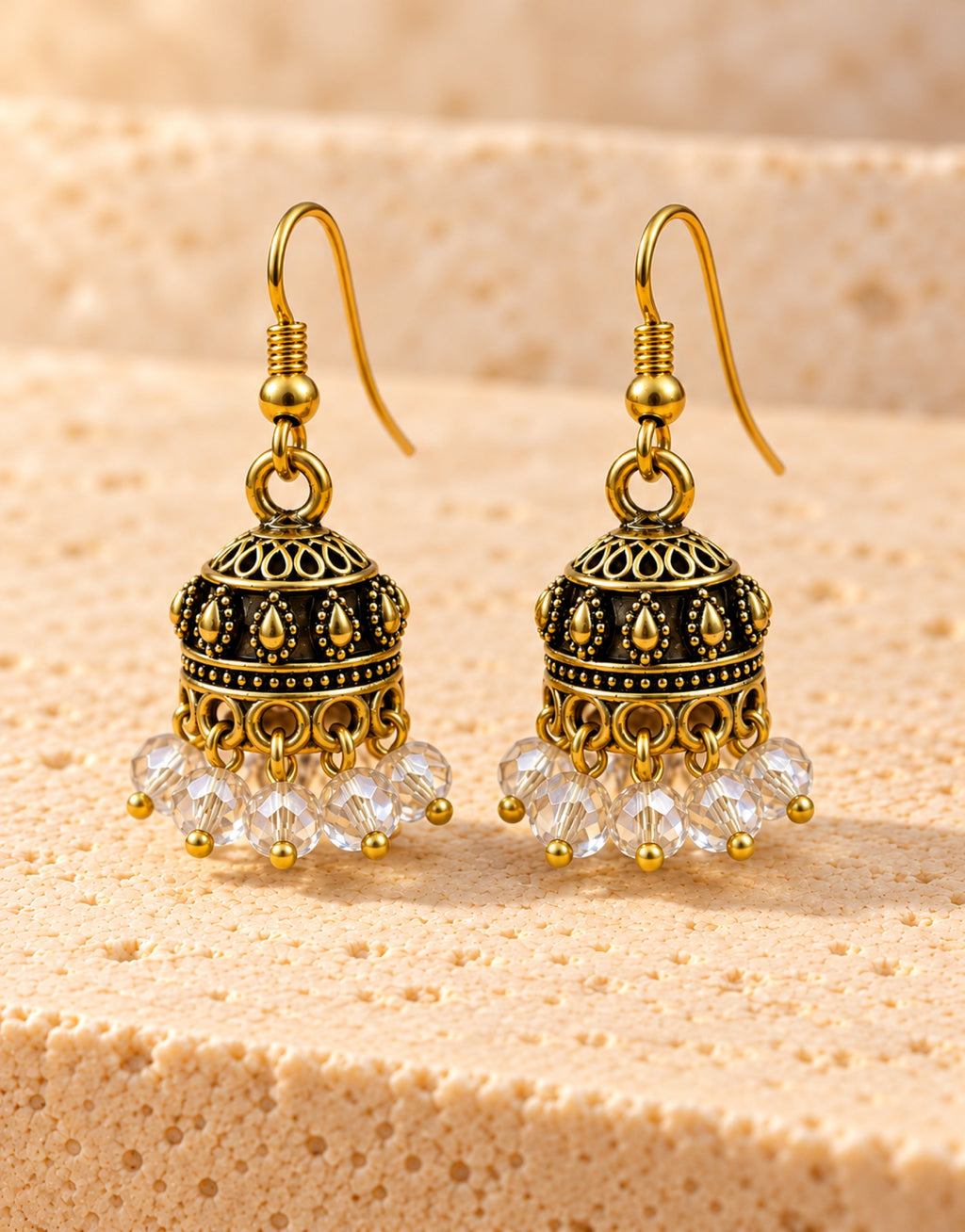 Orneza Antique Gold-Tone Mini Jhumka Earrings with Clear Crystal Beads — front view