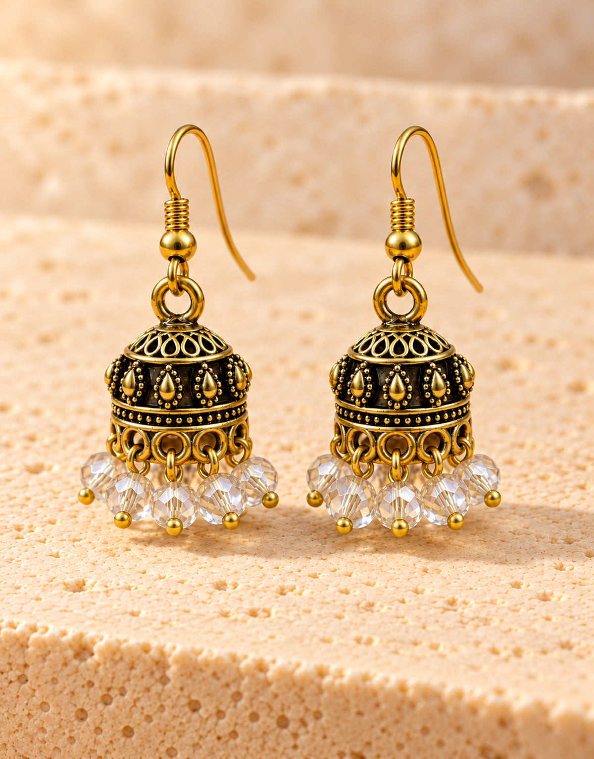 Orneza Antique Gold-Tone Mini Jhumka Earrings with Clear Crystal Beads — front view