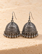 Orneza Dark Oxidised Engraved Bell Jhumka Earrings — front view