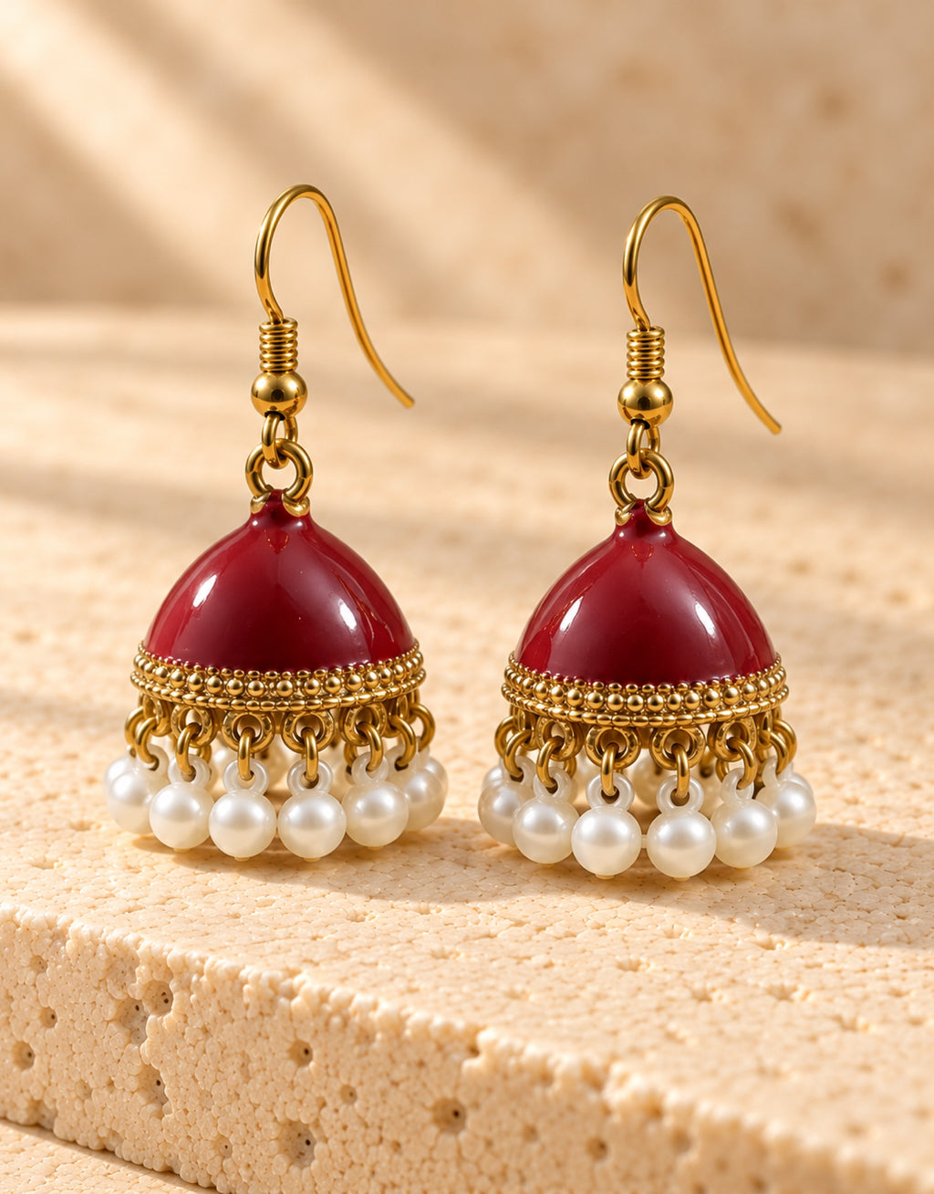 Orneza Maroon Enamel Jhumka Earrings with Pearls — angle view