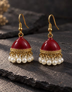 Orneza Maroon Enamel Jhumka Earrings with Pearls — styled view